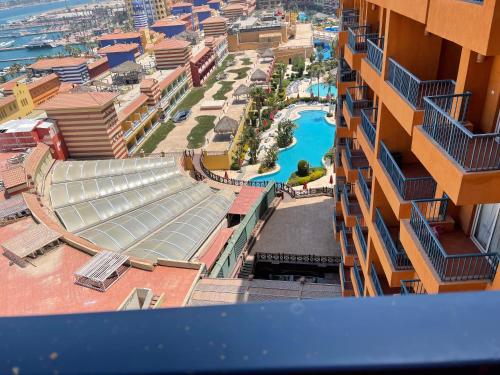 an aerial view of a resort with a swimming pool at sea view apartment in Porto Marina hotel tower in El Alamein