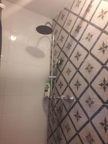Koupelna v ubytování Plitzner Belvárosi Apartmanház