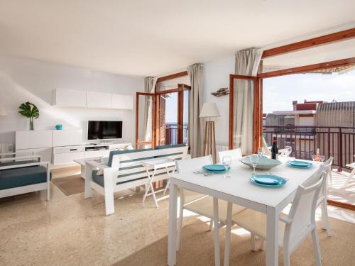 a living room with a white table and chairs at Apartment Cofisa-2 by Interhome in Jávea