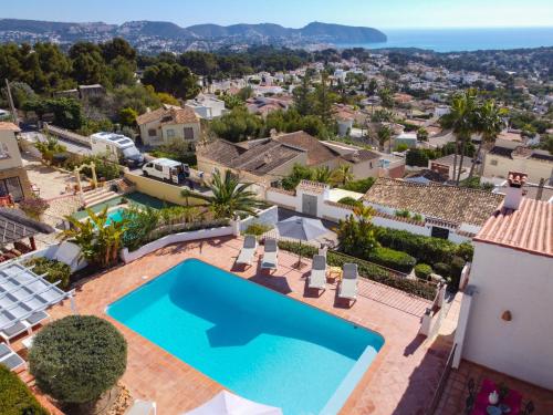 an image of a villa with a swimming pool at Holiday Home El Olivo by Interhome in Moraira