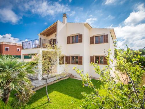 an image of a house with a garden at Villa Es Trenc Pool-Beach House Xaloc 99 by Interhome in Sa Ràpita