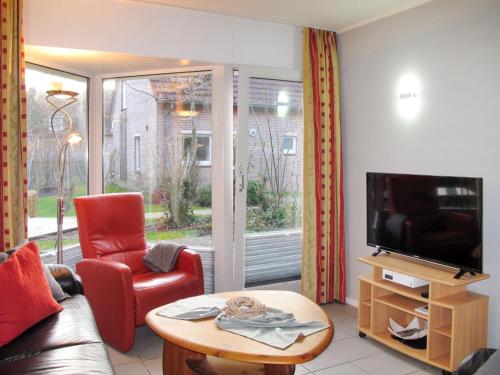 Μια τηλεόραση ή/και κέντρο ψυχαγωγίας στο Holiday Home Nordseeblick by Interhome