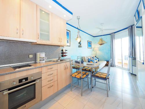 A kitchen or kitchenette at Apartment Club Nautic-17 by Interhome