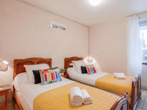 En eller flere senge i et værelse på Apartment Mer et Soleil by Interhome