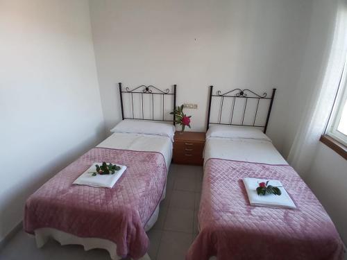 Ένα ή περισσότερα κρεβάτια σε δωμάτιο στο Hostal San Cristobal - Pontedeume
