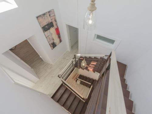 an overhead view of a staircase in a house at Holiday Home Es Reco by Interhome in Costitx