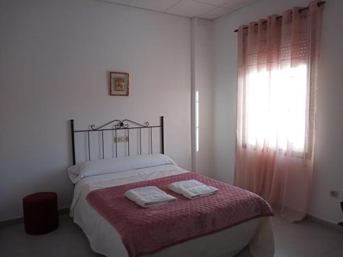 Ένα ή περισσότερα κρεβάτια σε δωμάτιο στο Hostal San Cristobal - Pontedeume