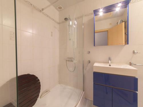 a bathroom with a shower and a sink at Apartment Tivoli Gardens-4 by Interhome in Mispelburg
