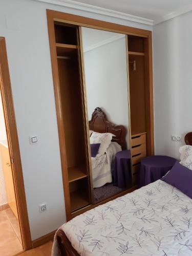 Ένα ή περισσότερα κρεβάτια σε δωμάτιο στο CASAMAMPODRE