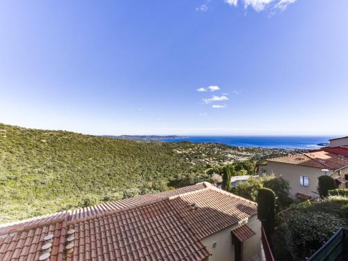 a view of the ocean from the roof of a house at Apartment Les Sauvagières II-5 by Interhome in Cavalaire-sur-Mer