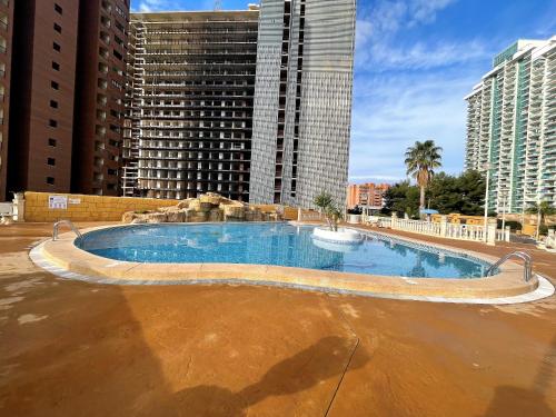 The swimming pool at or close to A551 - Atrium Beach 3 - 2004 Finestrat s.l.