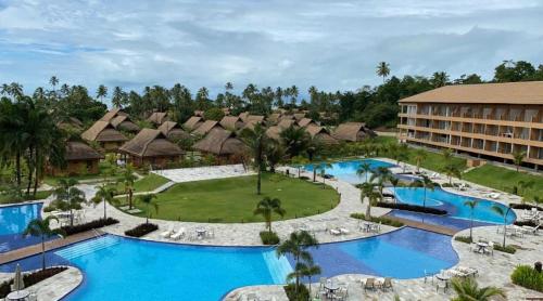 an aerial view of a resort with two pools at Eco resort Praia dos Carneiros in Tamandaré