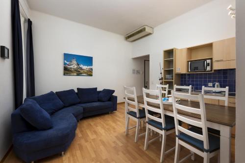 Kuchyň nebo kuchyňský kout v ubytování GuestHouse Lugano Apartments by LR