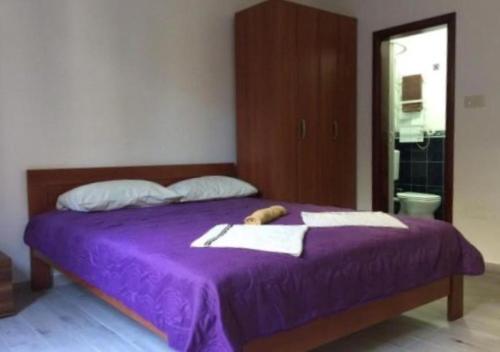 Postel nebo postele na pokoji v ubytování Villa Lutovac Budva