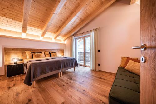 Postel nebo postele na pokoji v ubytování Chalet Alpendomizil Ahorn