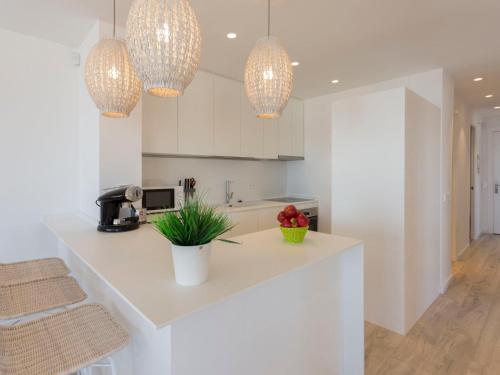 Η κουζίνα ή μικρή κουζίνα στο Apartment Bahia-9 by Interhome