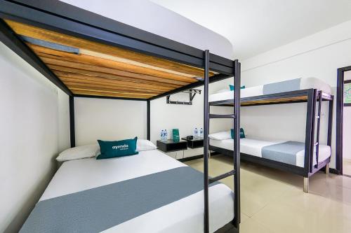 Bunk bed o mga bunk bed sa kuwarto sa Ayenda Mirador del Café