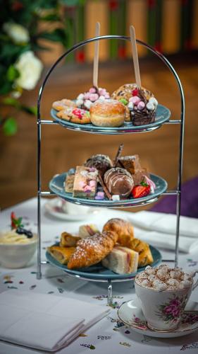 a display of pastries and desserts on a table at Longcourt House Hotel in Newcastle West