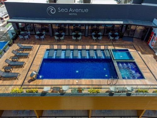 an overhead view of a swimming pool on a building at Sea Avenue Hotel in San Andrés