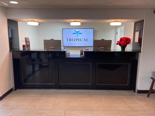 The lobby or reception area at Tropical Palms Hotel