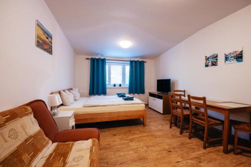 Postel nebo postele na pokoji v ubytování Lipno nad Vltavou - Apartman 23 - WiFi, Parking, Netflix