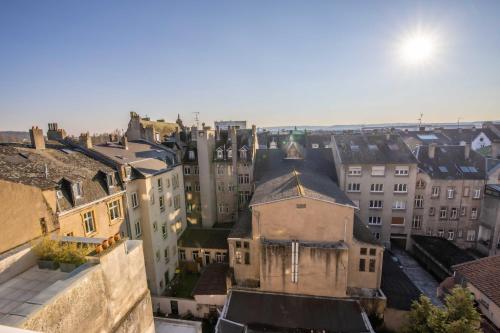 an aerial view of a city with buildings at Hôtel du Parc Thionville Centre in Thionville