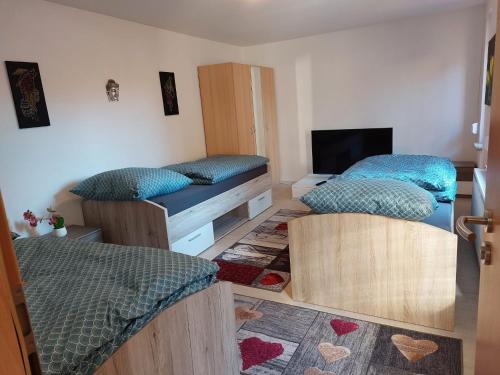 Postel nebo postele na pokoji v ubytování Ferienwohnung Calau