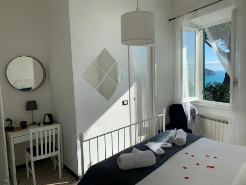 Voodi või voodid majutusasutuse Corniglia Dreams toas