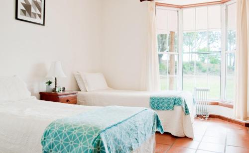 Ένα ή περισσότερα κρεβάτια σε δωμάτιο στο Bimbadgen Estate