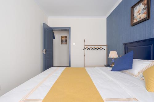 Voodi või voodid majutusasutuse Locals Apartment Inn 01 toas