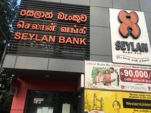 a sign for a selvan bank on a building at Visakha 6 in Colombo