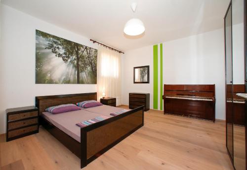 Posteľ alebo postele v izbe v ubytovaní Beach Apartments