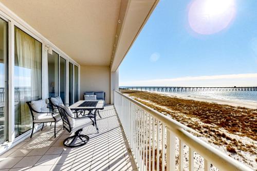 a balcony with a view of the beach at Navarre Beach Regency 308 in Navarre
