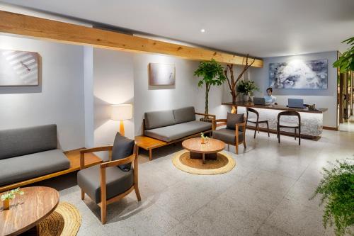 Χώρος καθιστικού στο Silverland Min Hotel