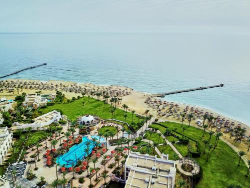 an aerial view of a water park next to the ocean at Pickalbatros The Palace Port Ghalib in Port Ghalib