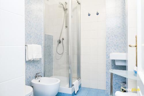 Koupelna v ubytování Lia Rooms