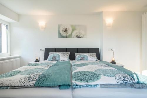 Postel nebo postele na pokoji v ubytování Ferienwohnung Pusteblume