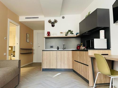 a kitchen with a sink and a counter top at MUROS - City Modern Living in Trento in Trento