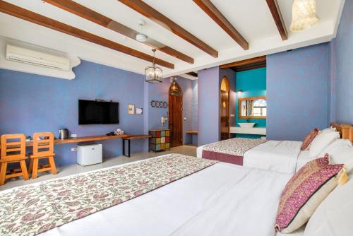 Ein Bett oder Betten in einem Zimmer der Unterkunft Moon Star Villa