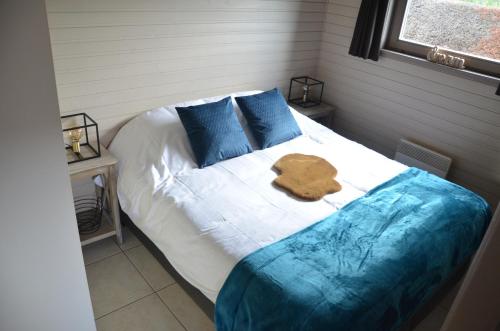 Ένα ή περισσότερα κρεβάτια σε δωμάτιο στο Vakantiehuis Gertrude