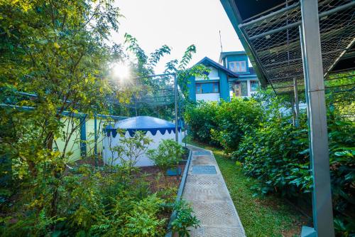Jardín al aire libre en Hibiscus Earth Private Pool Villa A CGH Earth SAHA Experience