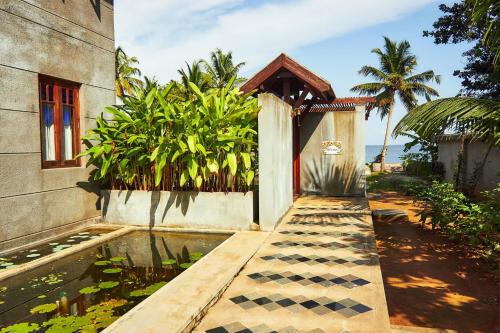 Jardín al aire libre en Hibiscus Earth Private Pool Villa A CGH Earth SAHA Experience