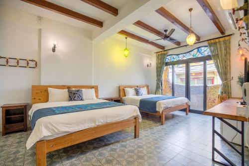 Ein Bett oder Betten in einem Zimmer der Unterkunft Moon Star Villa