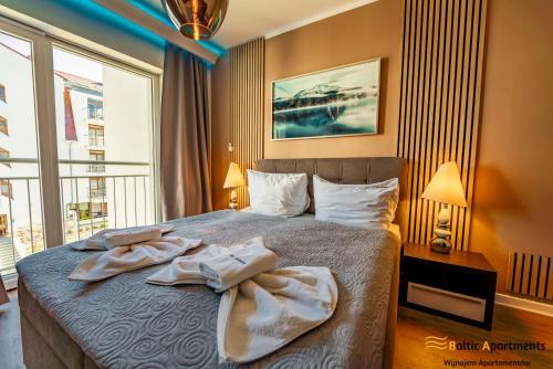 Postel nebo postele na pokoji v ubytování Baltic Apartments - Stella Baltic