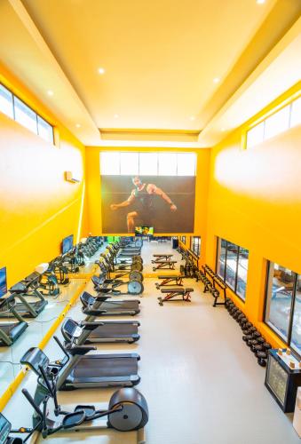 a large room filled with rows of exercise bikes at Holiday Inn - Bulawayo by IHG in Bulawayo