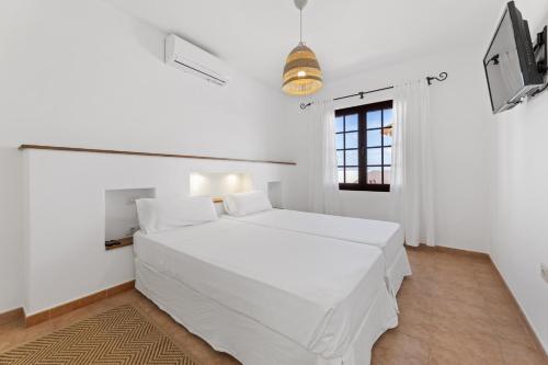 Postel nebo postele na pokoji v ubytování Villa 5 - Villasexperience
