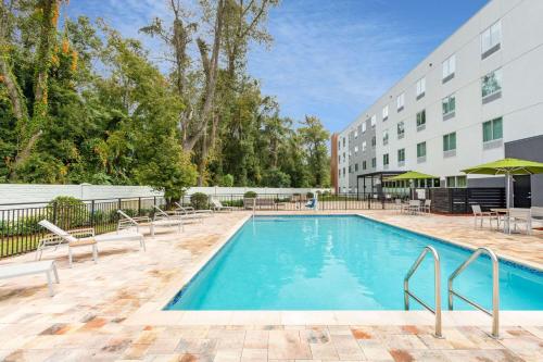 Poolen vid eller i närheten av Wyndham Garden Orlando Airport