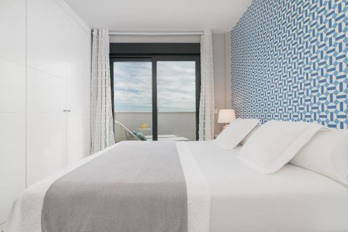 Postel nebo postele na pokoji v ubytování iloftmalaga Pacífico - Edf. Oceanía