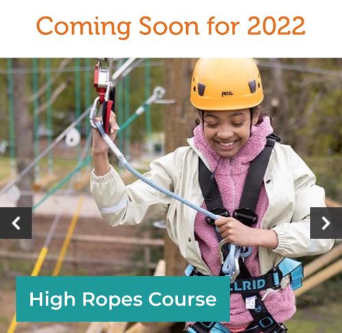 a girl on a zip line with a safety helmet at private rented caravan situated at Southview holiday park in Winthorpe