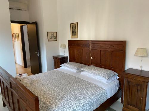 Кровать или кровати в номере Barolo Apartments